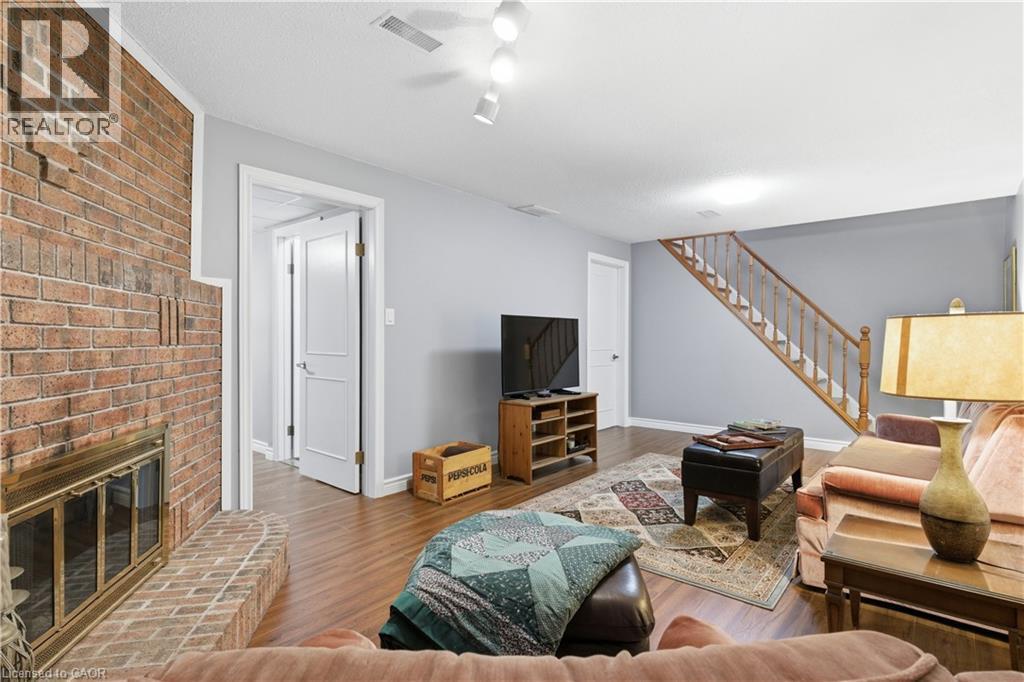 125 Covington Crescent, Kitchener, ON - Indoor Photo Showing Living Room With Fireplace
