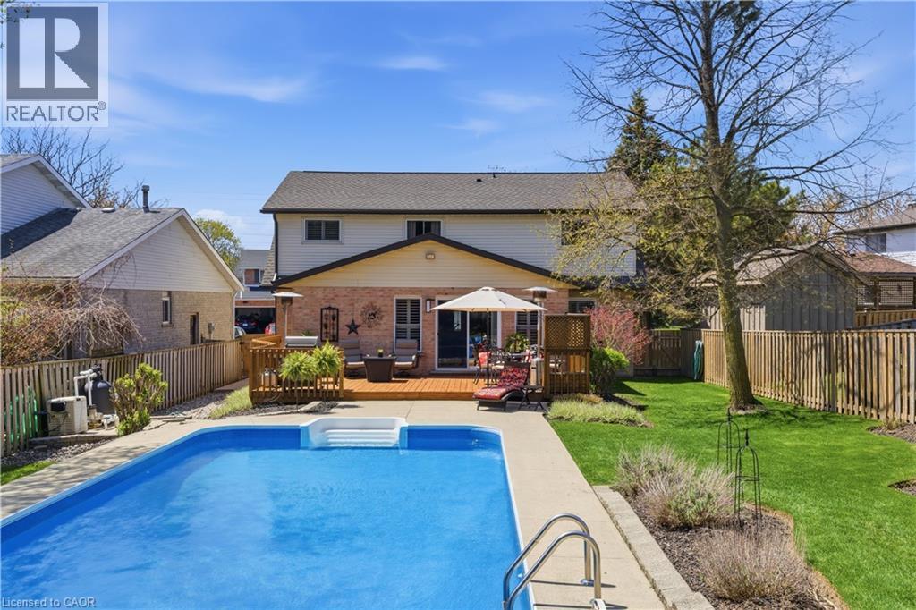 125 Covington Crescent, Kitchener, ON - Outdoor With In Ground Pool With Deck Patio Veranda With Backyard