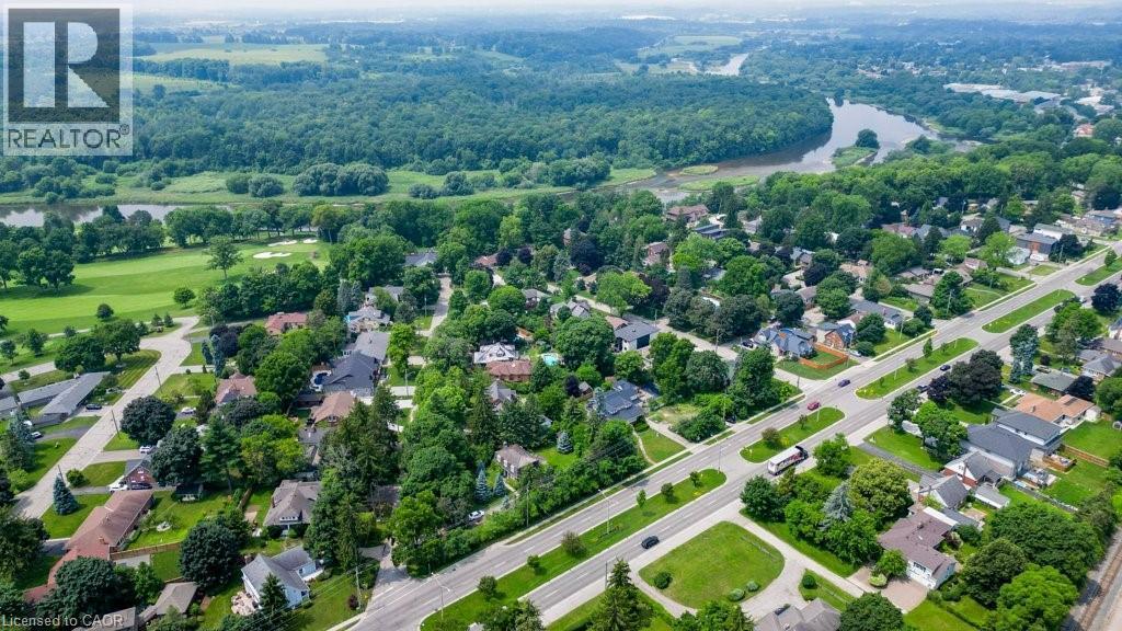 Aerial perspective showcasing a residential community with mature trees - 2032 Coronation Boulevard, Cambridge, ON - Outdoor With View