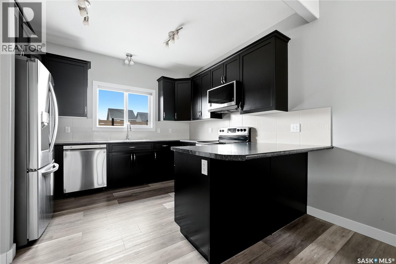 3636 Green Moss Lane, Regina, SK - Indoor Photo Showing Kitchen With Stainless Steel Kitchen With Upgraded Kitchen