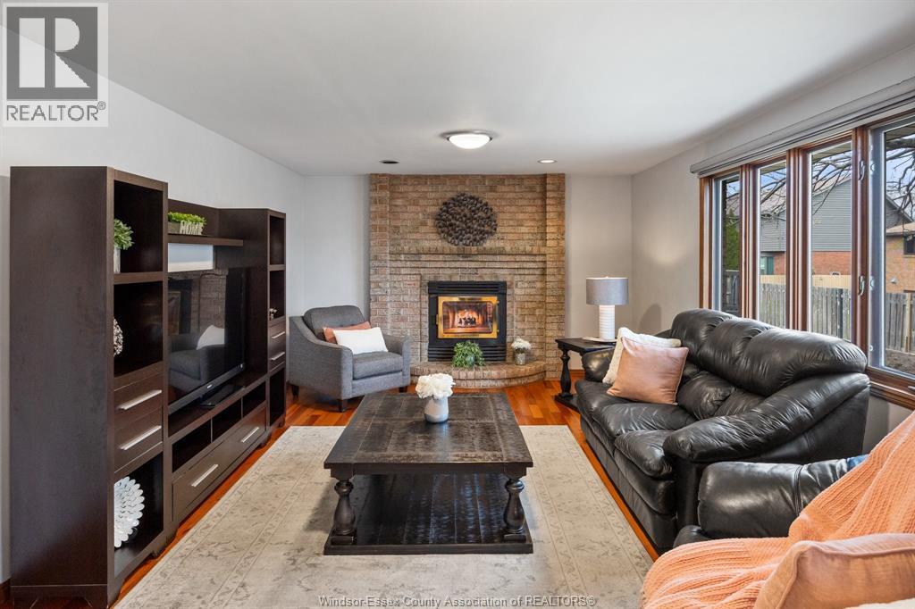 12314 Funaro Crescent, Tecumseh, ON - Indoor Photo Showing Living Room With Fireplace