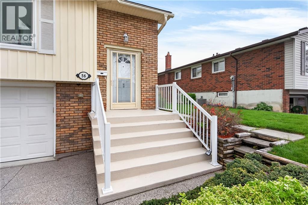 Brick and siding exterior with concrete steps and white railings - 56 Brookstream Court, Hamilton, ON - Outdoor