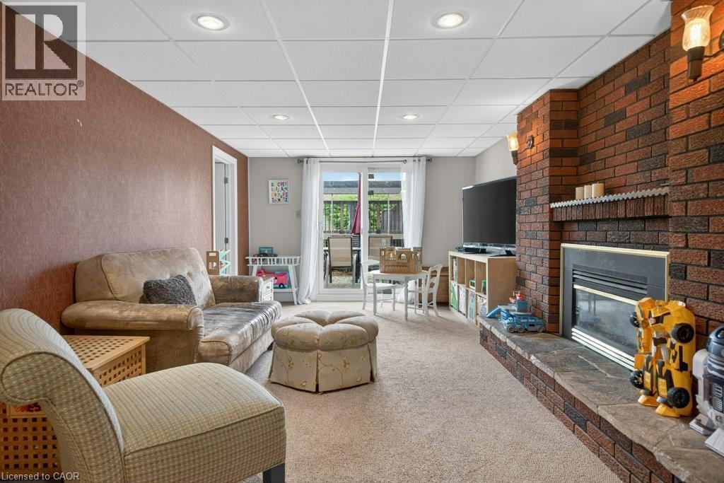 56 Brookstream Court, Hamilton, ON - Indoor Photo Showing Living Room With Fireplace