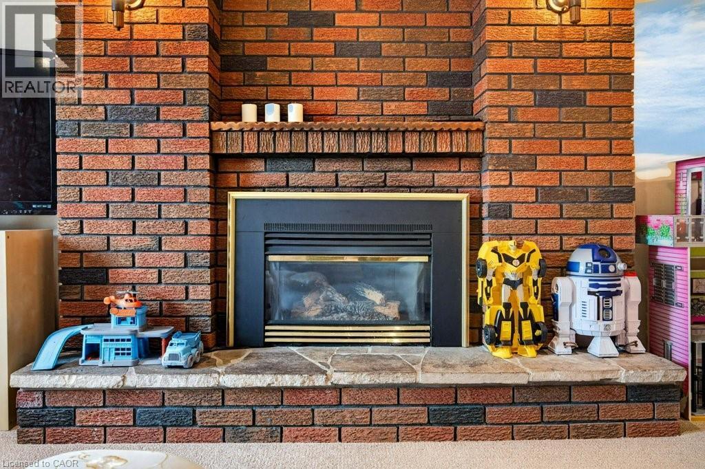 56 Brookstream Court, Hamilton, ON - Indoor Photo Showing Living Room With Fireplace