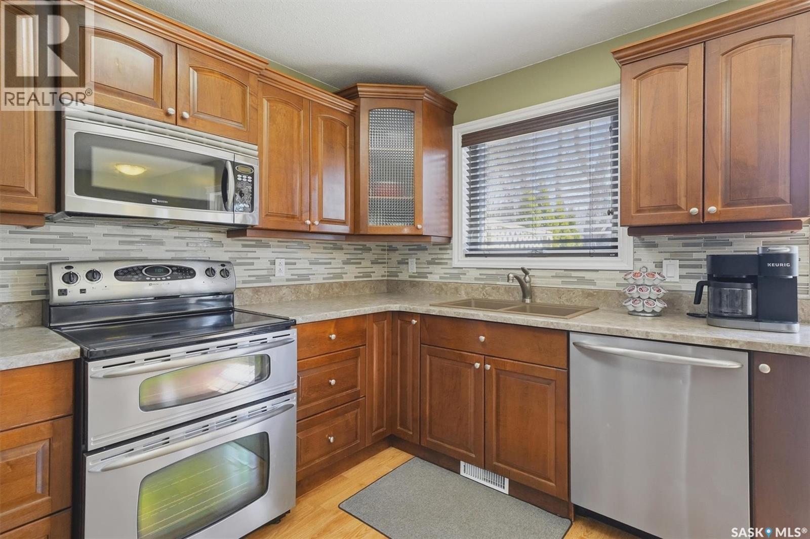414 Perreault Lane, Saskatoon, SK - Indoor Photo Showing Kitchen With Double Sink