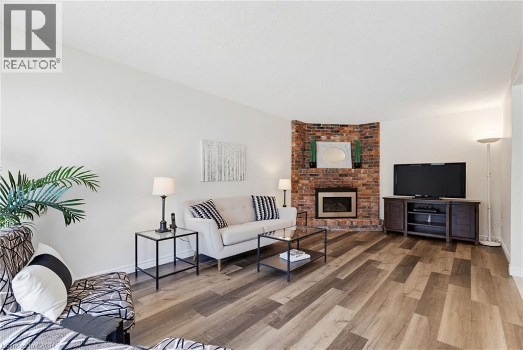 106 Maple Drive, Hamilton, ON - Indoor Photo Showing Living Room With Fireplace