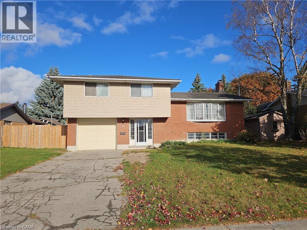 Split-level residence featuring a brick facade with beige siding - 66 Summit Avenue, Kitchener, ON - Outdoor