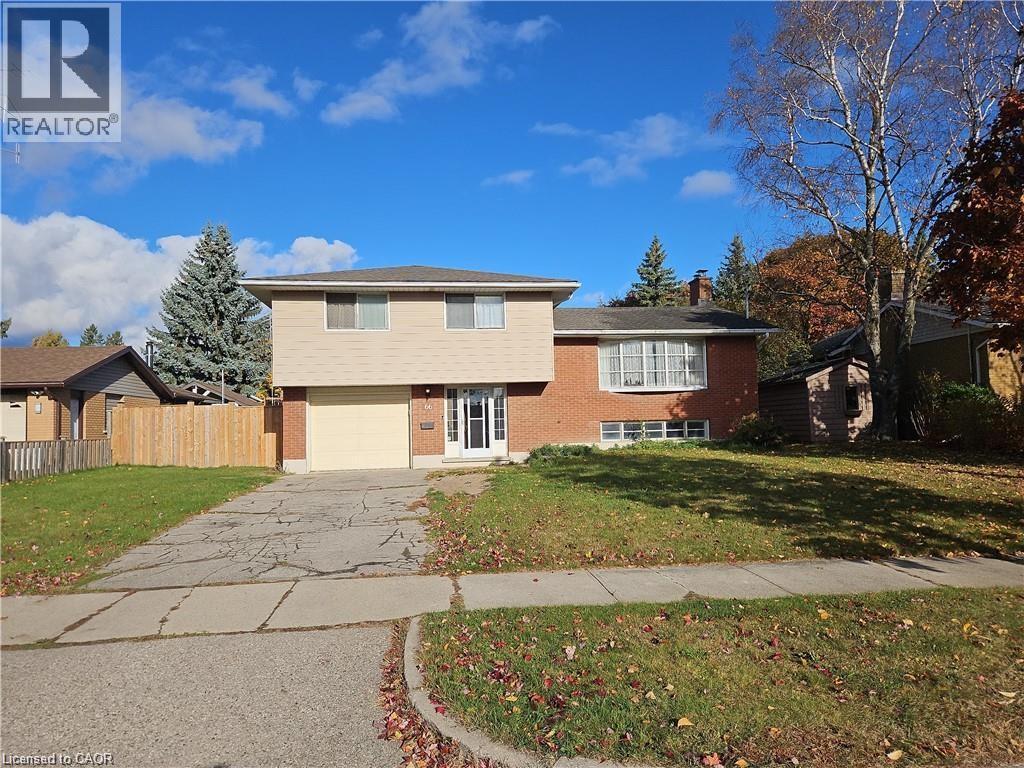 Split-level residence featuring a brick facade and upper-level siding - 66 Summit Avenue, Kitchener, ON - Outdoor