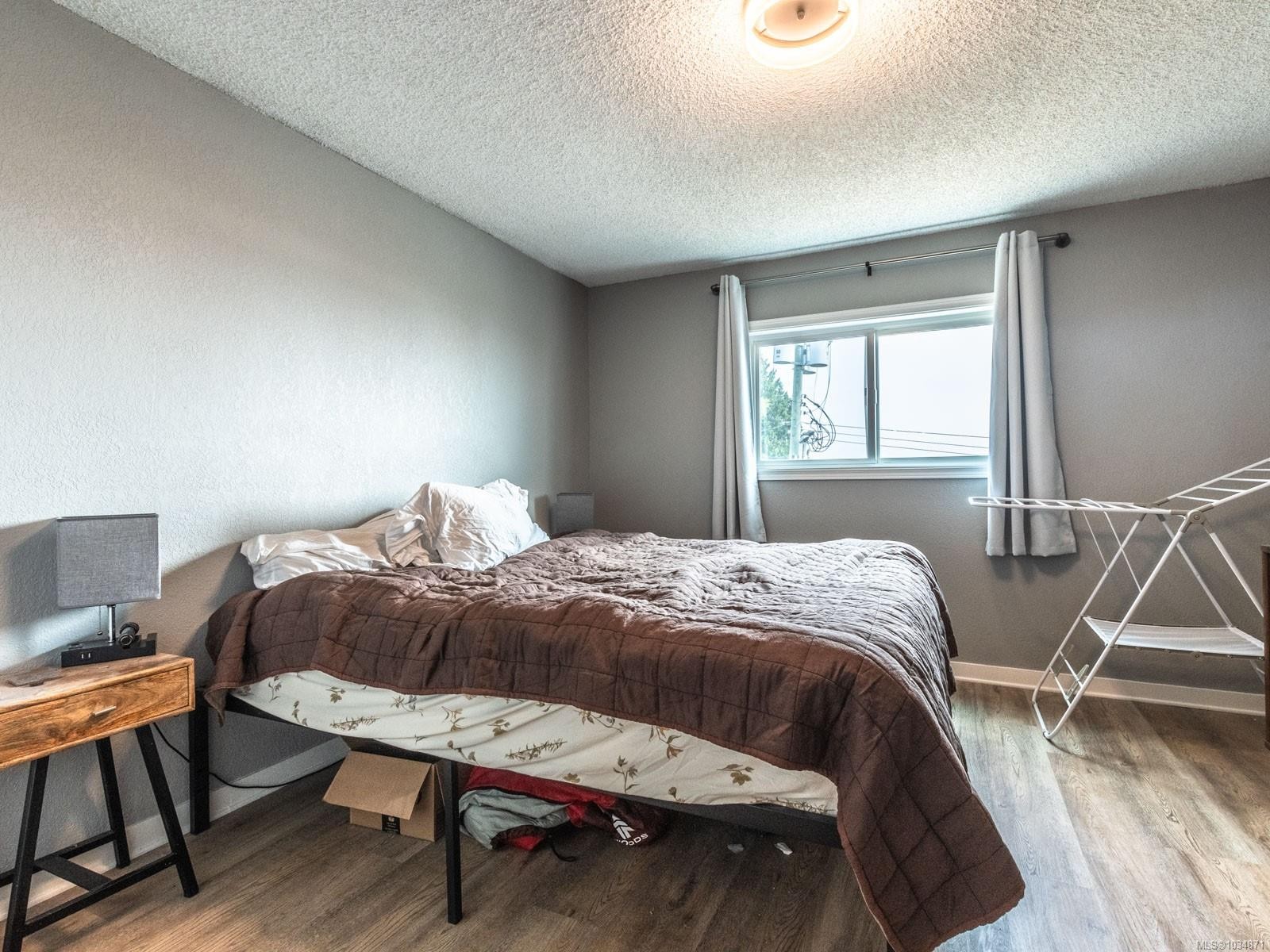 303-218 Bayview Ave, Ladysmith, BC - Indoor Photo Showing Bedroom