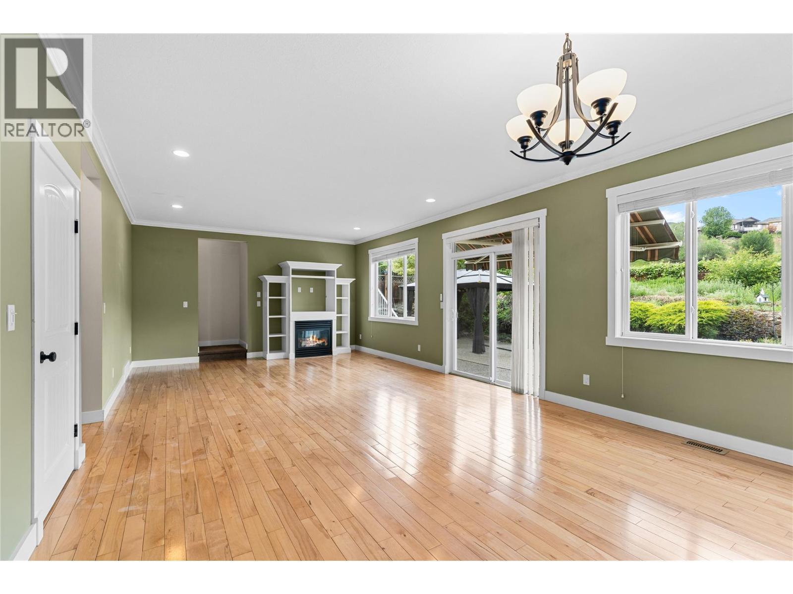 479 Middleton Way, Coldstream, BC - Indoor Photo Showing Other Room With Fireplace