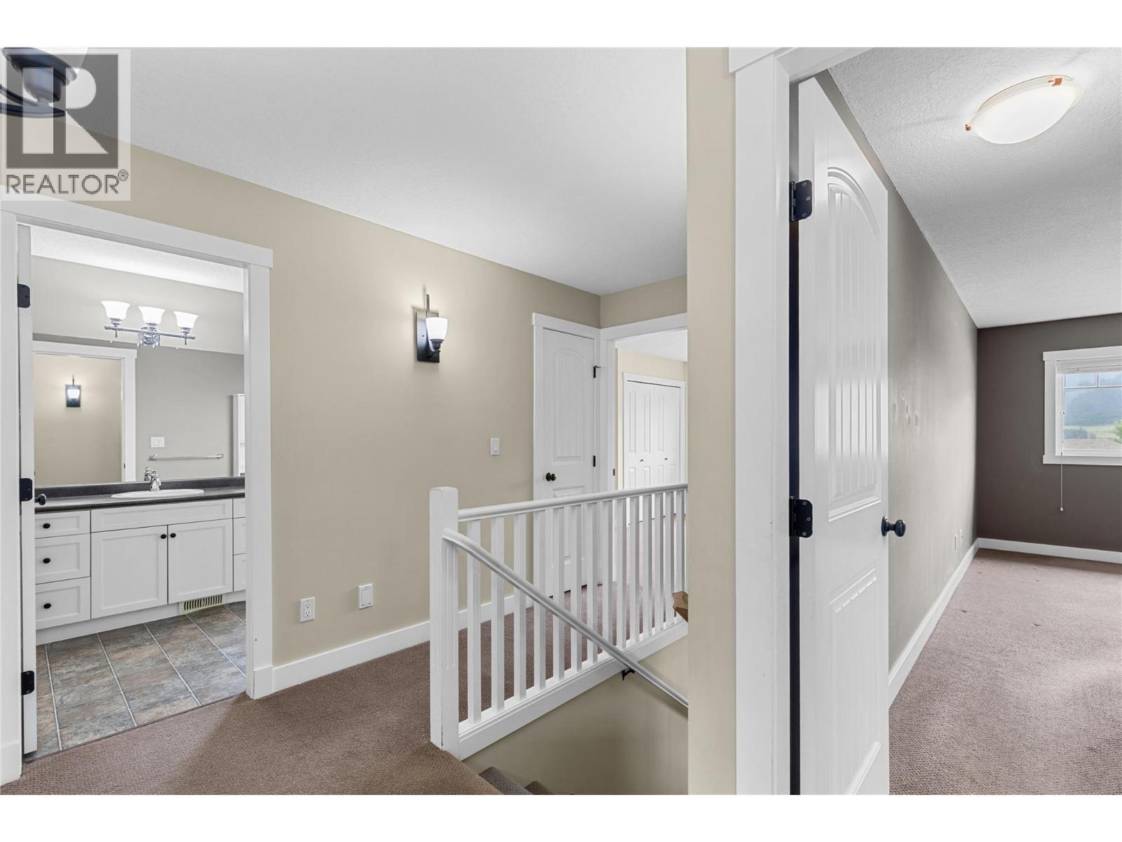 Upper landing - 479 Middleton Way, Coldstream, BC - Indoor Photo Showing Other Room