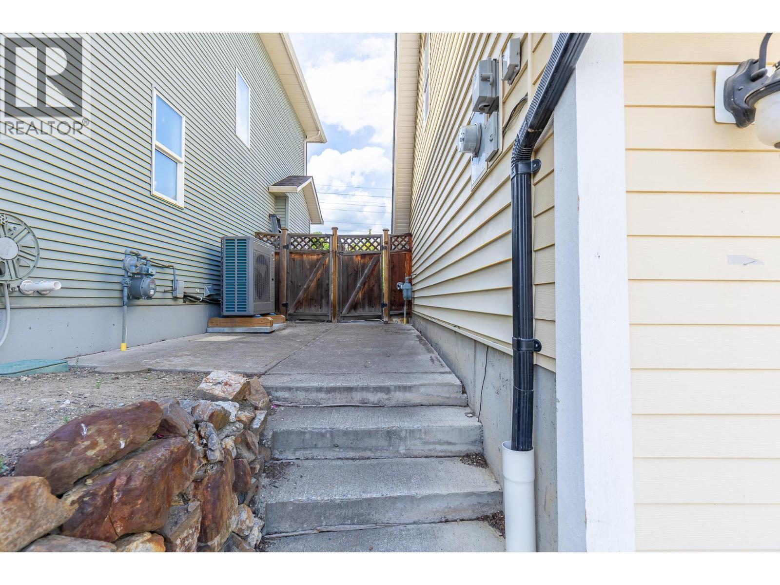 Side entrance - 479 Middleton Way, Coldstream, BC - Outdoor With Exterior