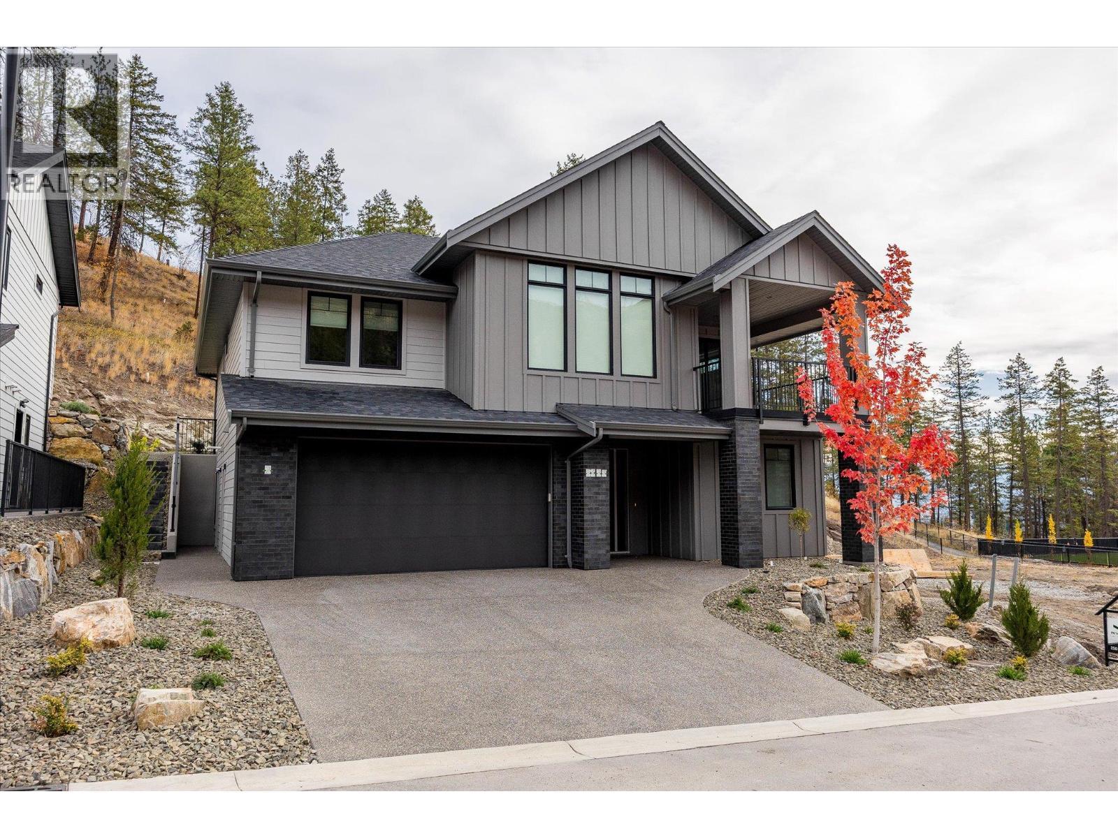 1437 April Springs Court, Kelowna, BC - Outdoor With Facade