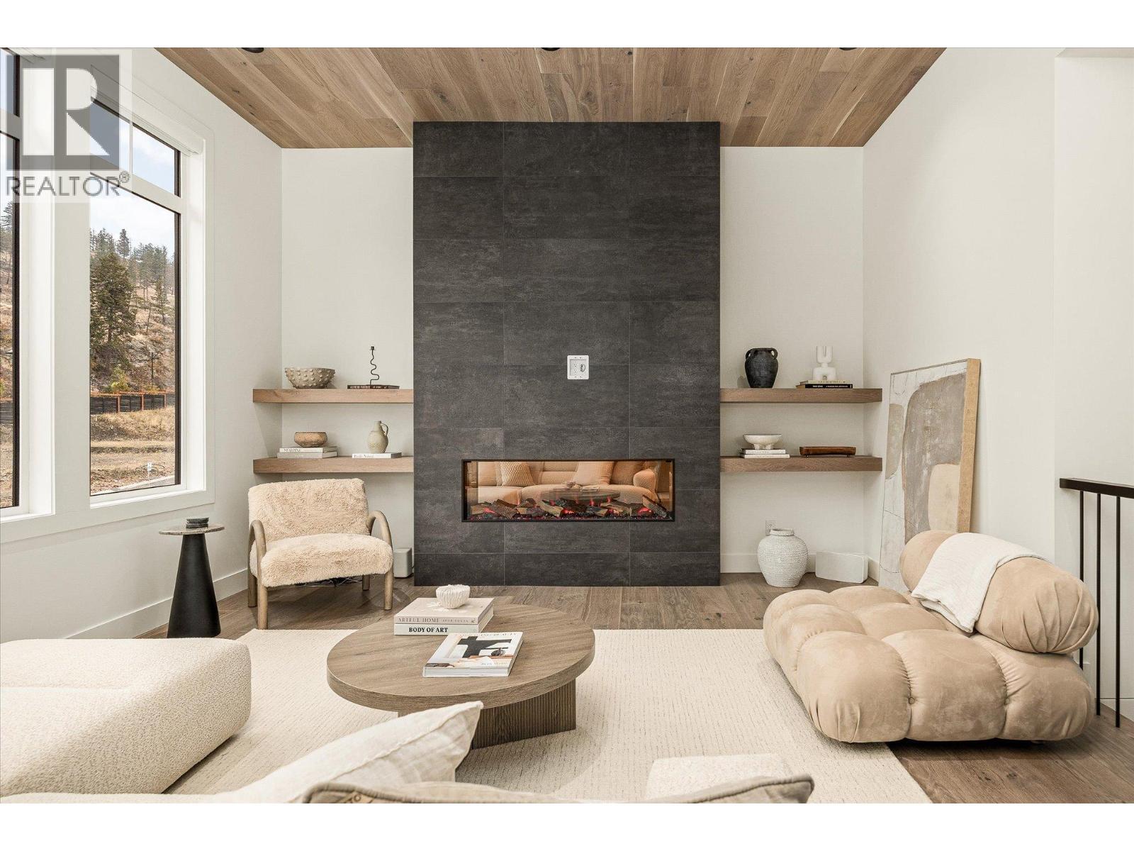 1437 April Springs Court, Kelowna, BC - Indoor Photo Showing Living Room With Fireplace
