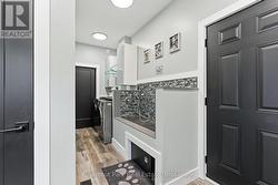 Pet wash station, laundry, and door to the garage -