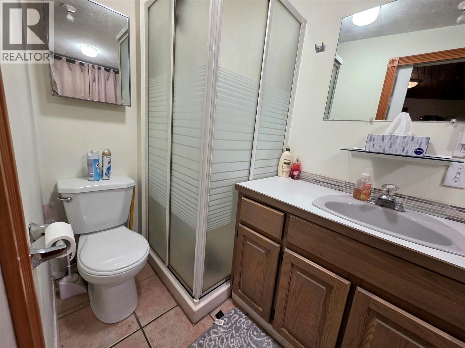 3 Piece Bathroom with storage - 6453 Pinaus Lake Road, Falkland, BC