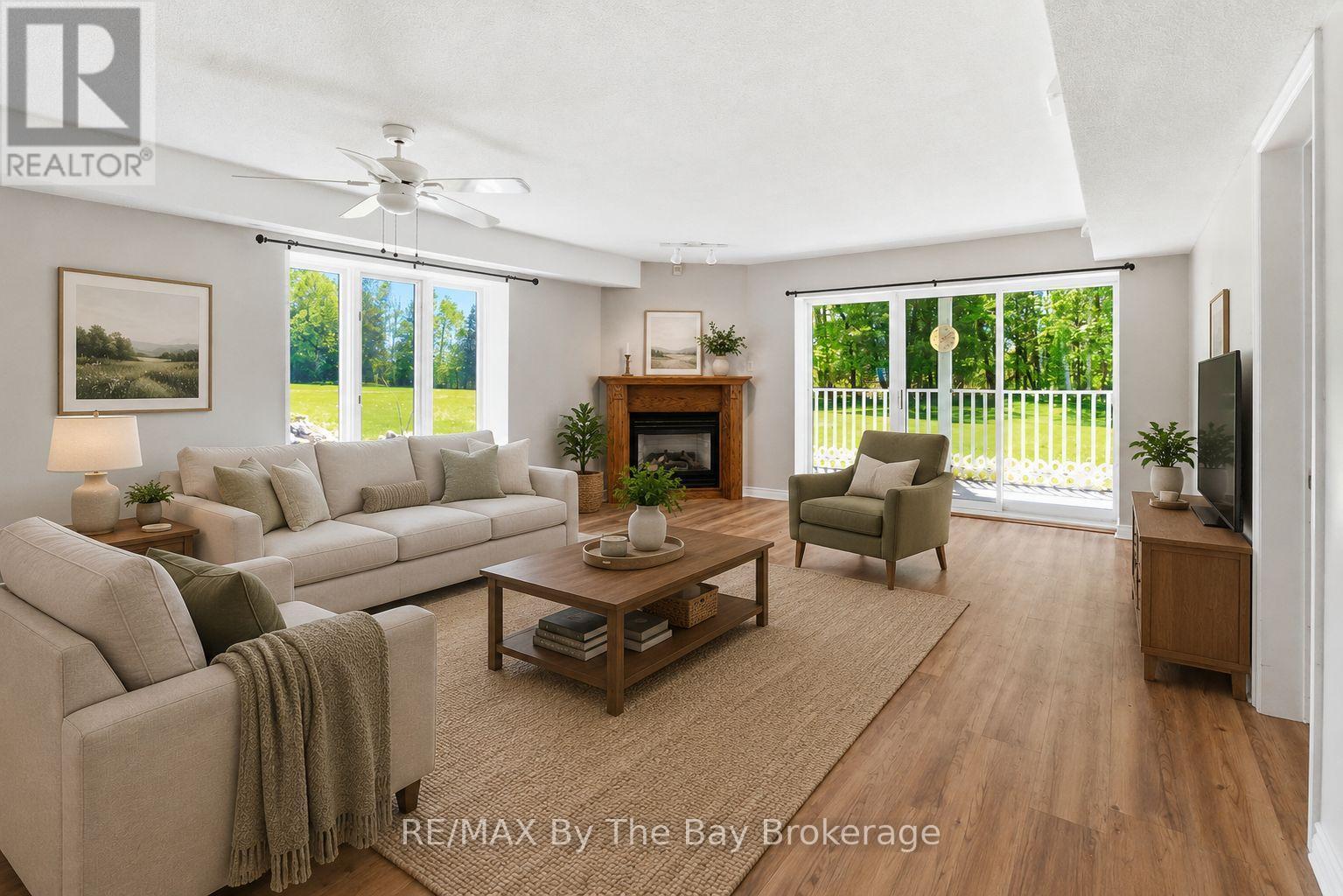 virtual staging - 1 - 10 Mulligan Lane, Wasaga Beach, ON - Indoor Photo Showing Living Room With Fireplace
