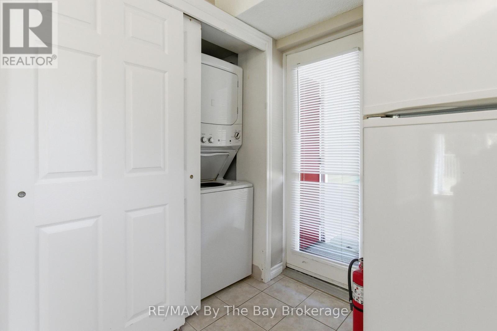 Convenient Laundry in the kit - 1 - 10 Mulligan Lane, Wasaga Beach, ON - Indoor Photo Showing Laundry Room