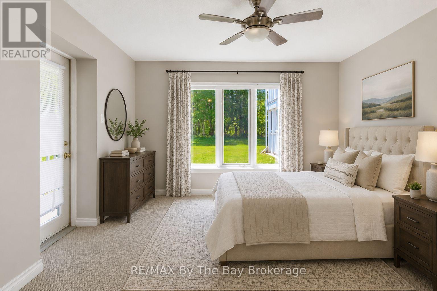 Virtually staged primary suite - 1 - 10 Mulligan Lane, Wasaga Beach, ON - Indoor Photo Showing Bedroom