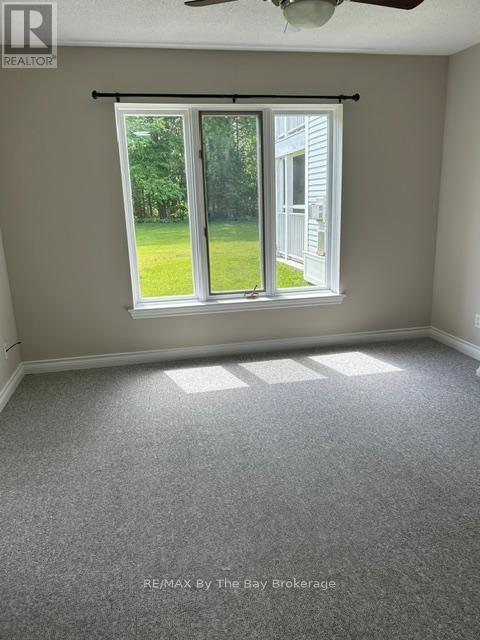 Primary suite new carpet - 1 - 10 Mulligan Lane, Wasaga Beach, ON - Indoor Photo Showing Other Room