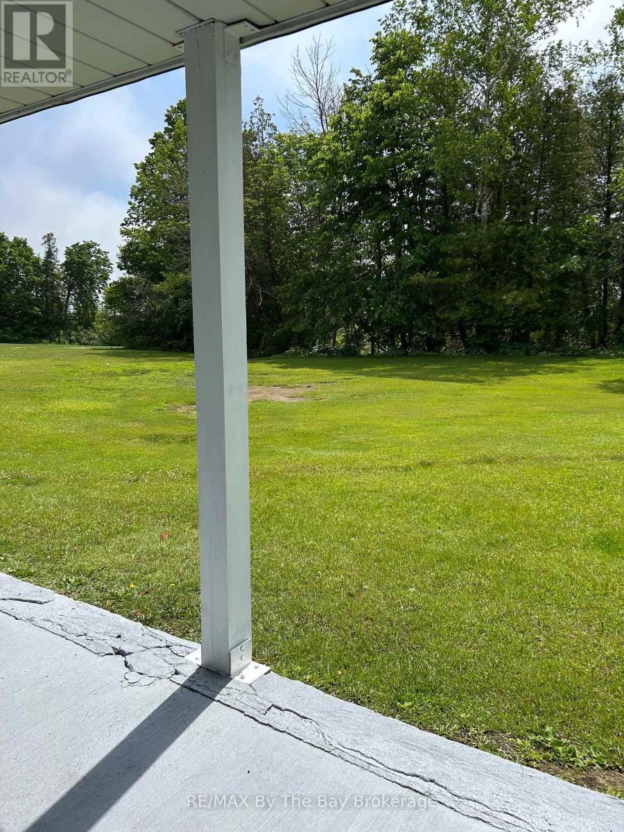 back patio overlooking nature and the golf course! - 1 - 10 Mulligan Lane, Wasaga Beach, ON - Outdoor