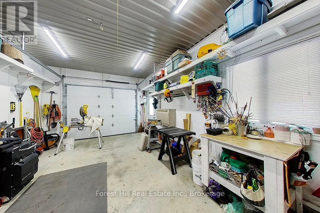 Insulated & heated Workshop - 157 Glen Fiddish Road, West Grey, ON - Indoor Photo Showing Garage