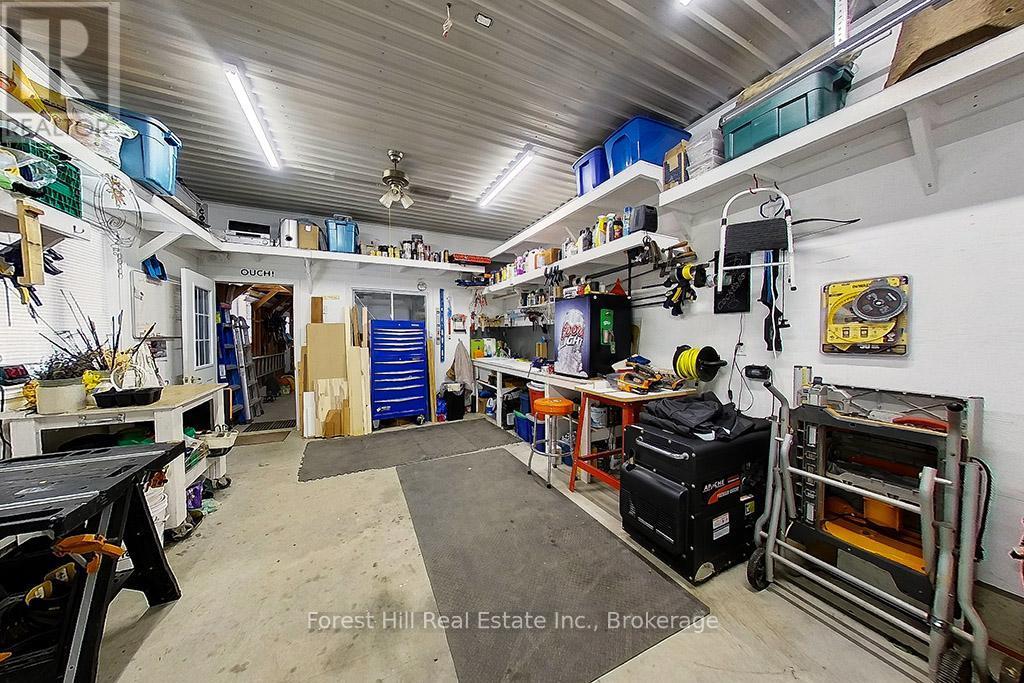 Insulated & heated Workshop - 157 Glen Fiddish Road, West Grey, ON - Indoor Photo Showing Garage