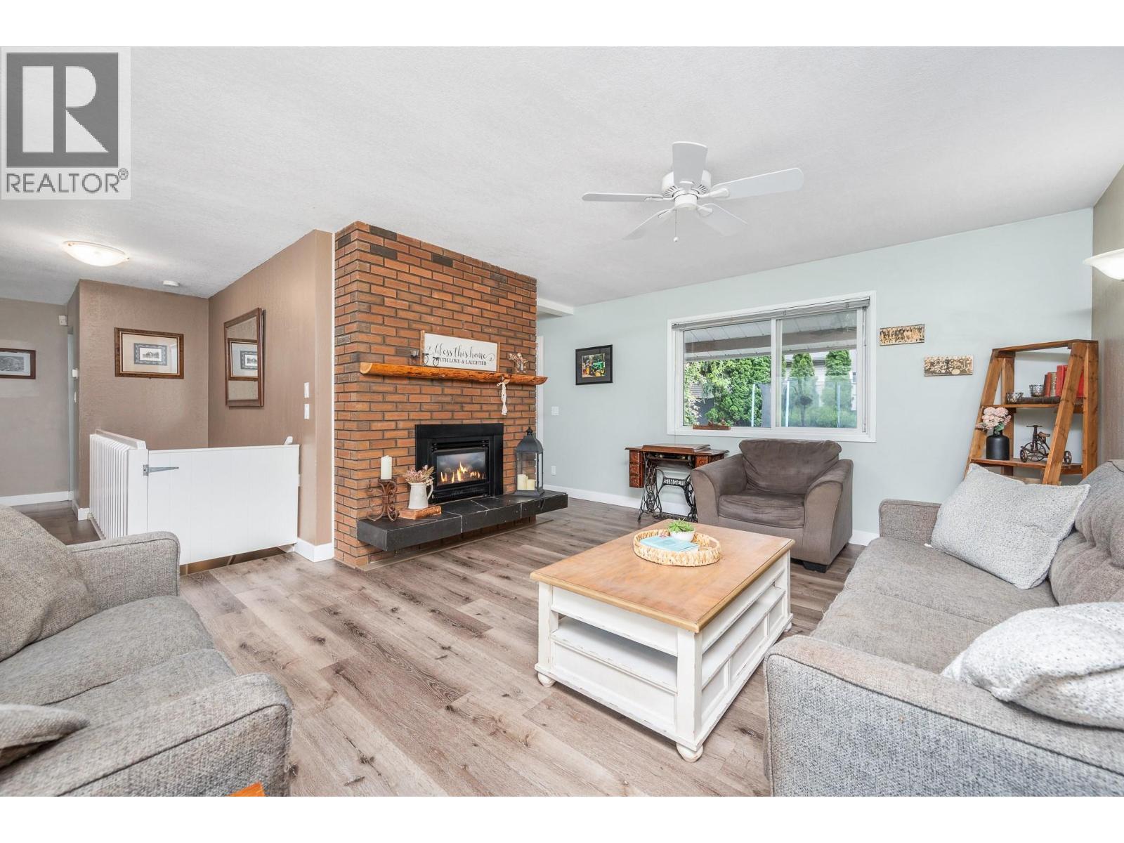 Cozy gas fireplace - 6596 Lavington Way, Coldstream, BC