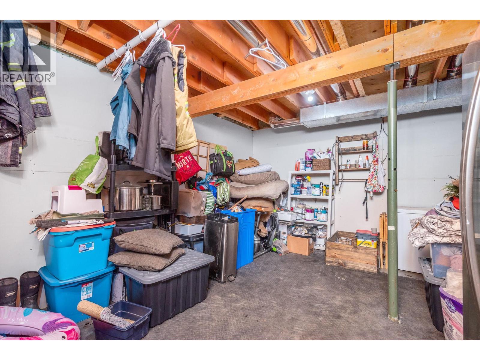 Storage area with direct access to outside. - 6596 Lavington Way, Coldstream, BC