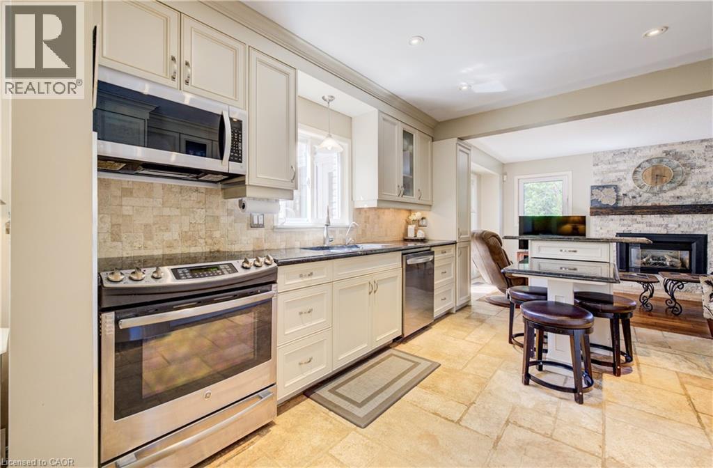 135 Royal Orchard Drive, Kitchener, ON - Indoor Photo Showing Kitchen With Fireplace With Upgraded Kitchen