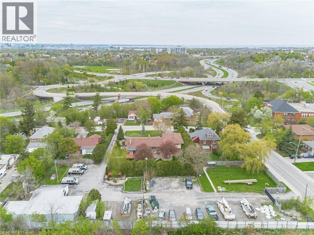 Aerial perspective showcasing a mixed-use parcel with undeveloped land - 262-270-276 Hixon Road, Hamilton, ON