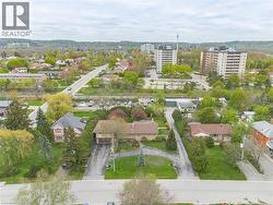 Residential neighborhood featuring varied architectural styles and mature landscaping -