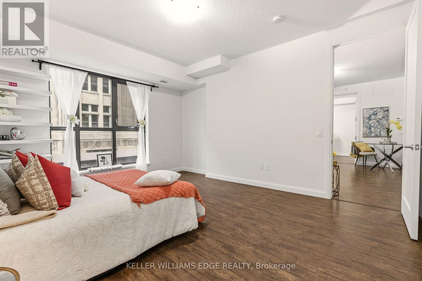 Spacious primary bedroom with large windows - 408 - 112 King Street E, Hamilton, ON
