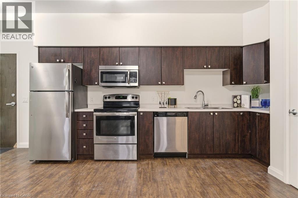 Kitchen w/ Stainless Steel Appliances - 112 King Street E Unit# 408, Hamilton, ON