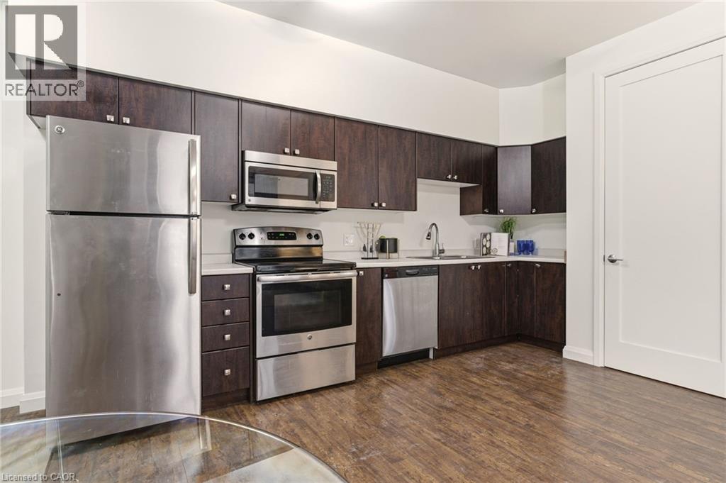 Kitchen w/ Stainless Steel Appliances - 112 King Street E Unit# 408, Hamilton, ON
