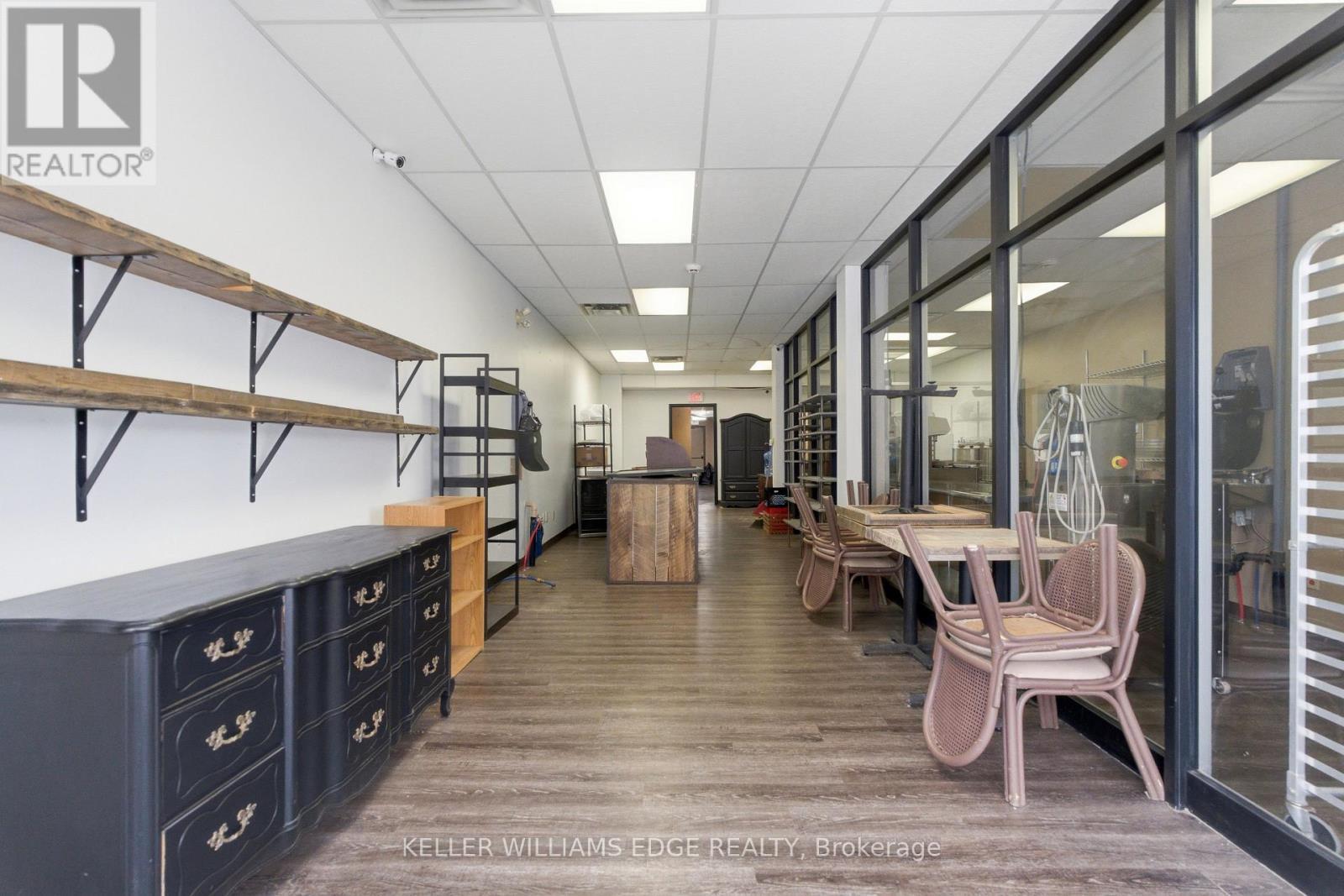 Main floor retail and glass wall - 389 Dundas Street, Woodstock, ON