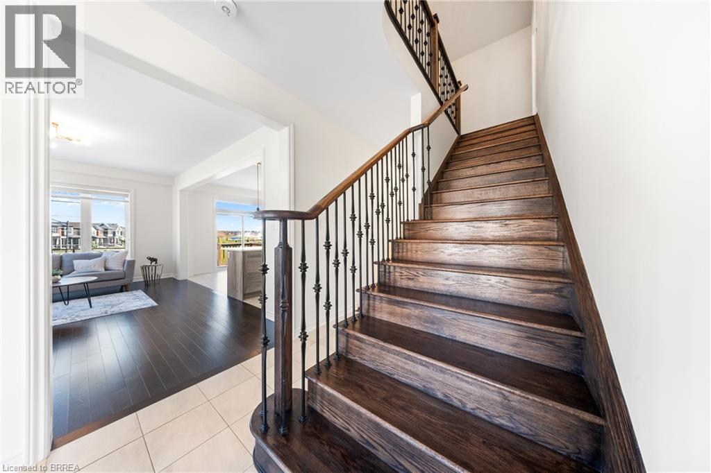 Staircase with tile patterned floors - 1 Bee Crescent, Brantford, ON