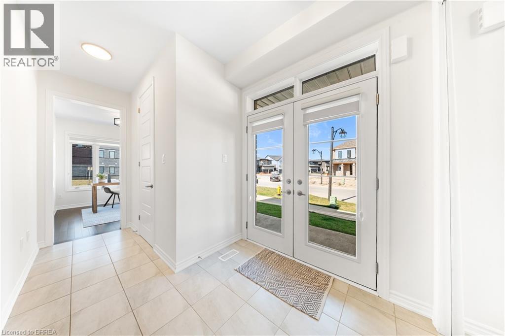 Entryway featuring french doors and tile patterned flooring - 1 Bee Crescent, Brantford, ON