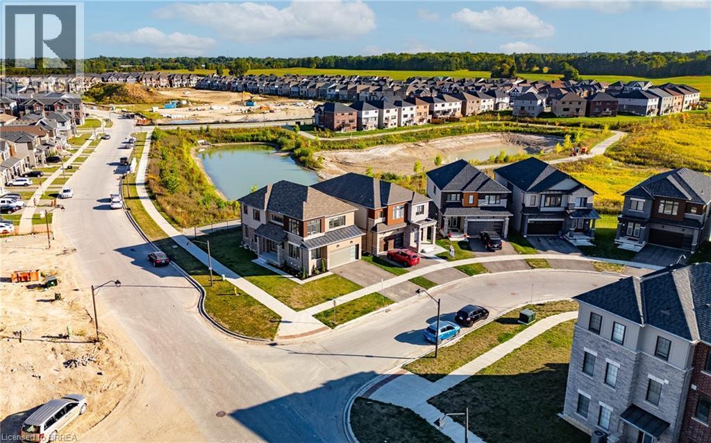 Aerial view of residential area featuring a large body of water - 1 Bee Crescent, Brantford, ON