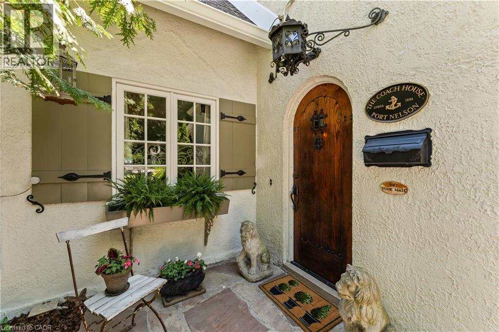 Custom front door with speakeasy. Antique fixture. - 3040 First Street, Burlington, ON - Outdoor