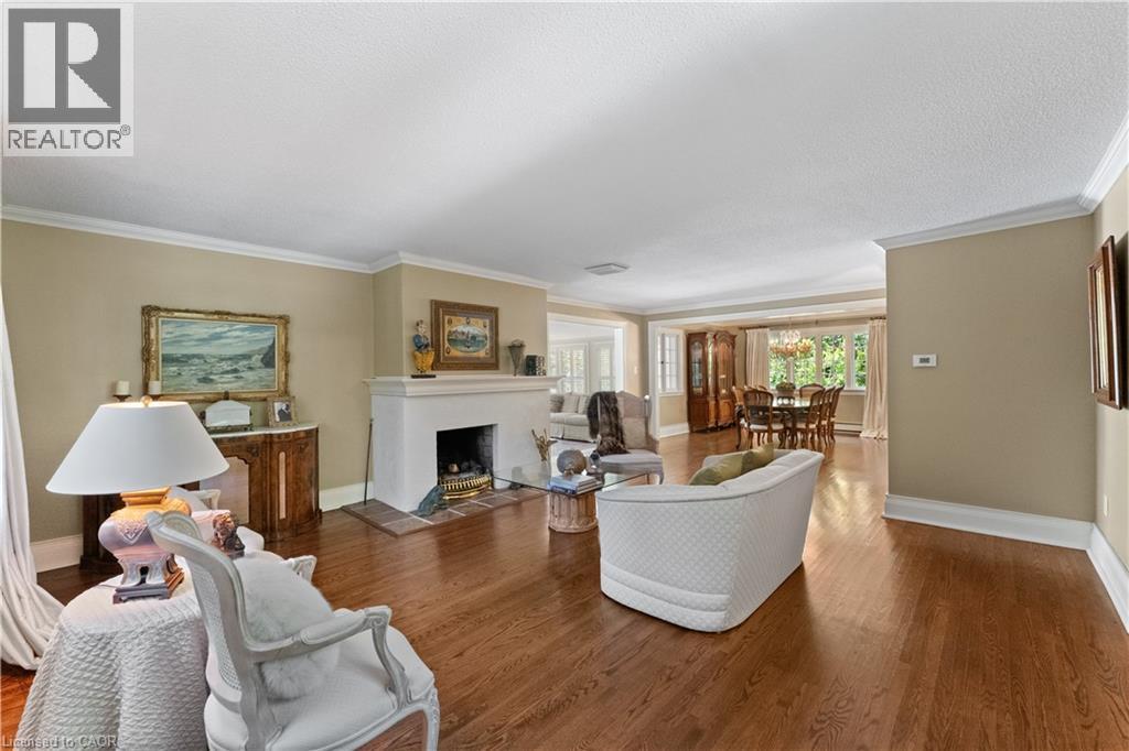 Open concept main floor, adjacent sunroom. Refinished quarter-cut oak flooring. - 3040 First Street, Burlington, ON - Indoor Photo Showing Kitchen With Upgraded Kitchen