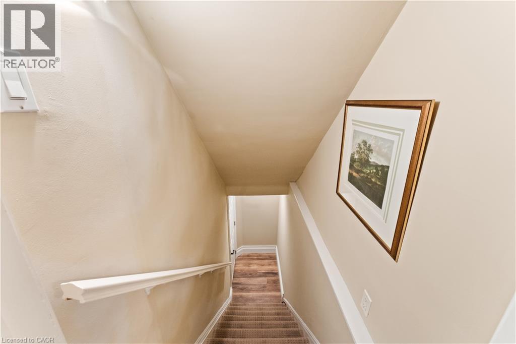 Stairway down to unfinished basement. - 3040 First Street, Burlington, ON - Indoor Photo Showing Other Room