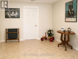 Lower Foyer With Door To Wine/Panty/Cold Cellar -