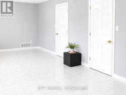 This Room Has Two Doors Leading From Hallway -