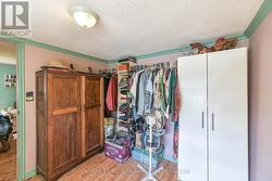 Primary bedroom closet (AI enhanced) -