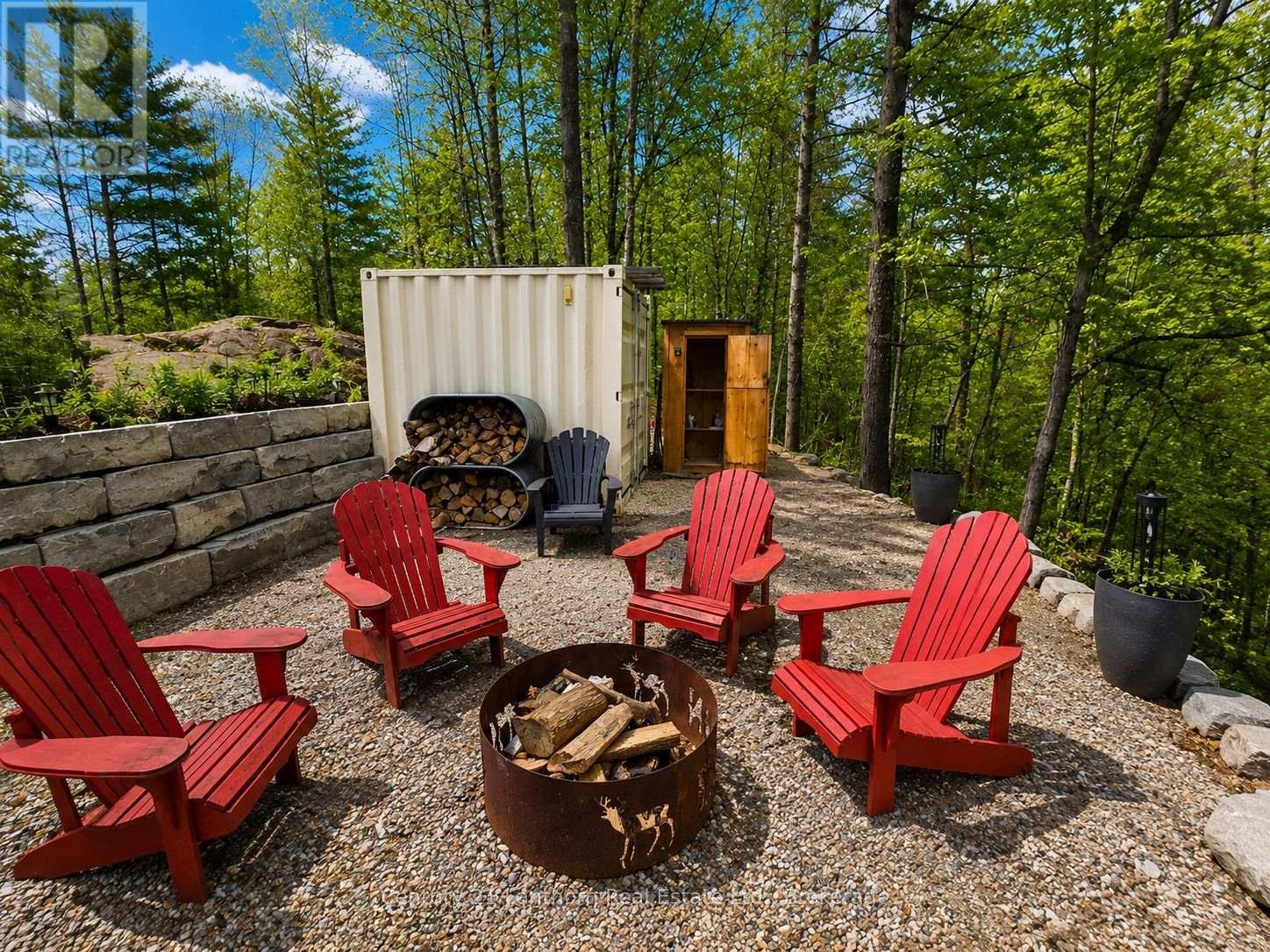 Firepit, Seacan Bar, and Outhouse with Running wtr - 1045 Carnahan Lane, Frontenac (Frontenac Centre), ON