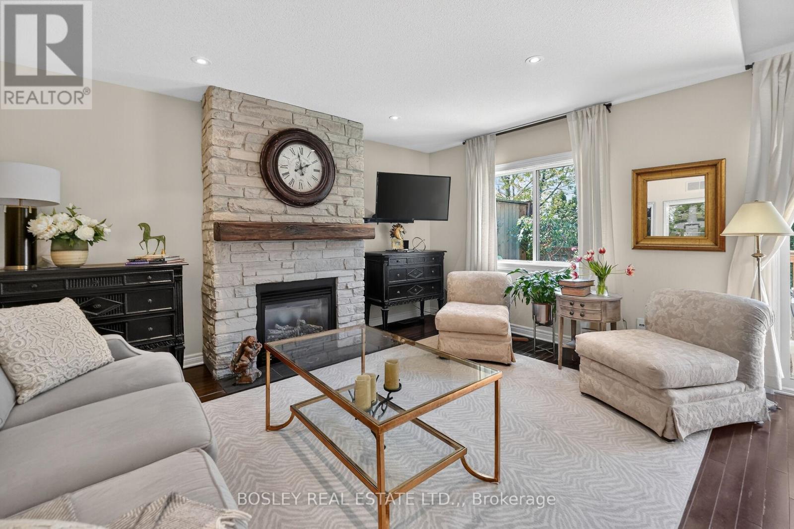 Unit 12 - 7 Gibson Place, St. Catharines (Downtown), ON - Indoor Photo Showing Living Room With Fireplace