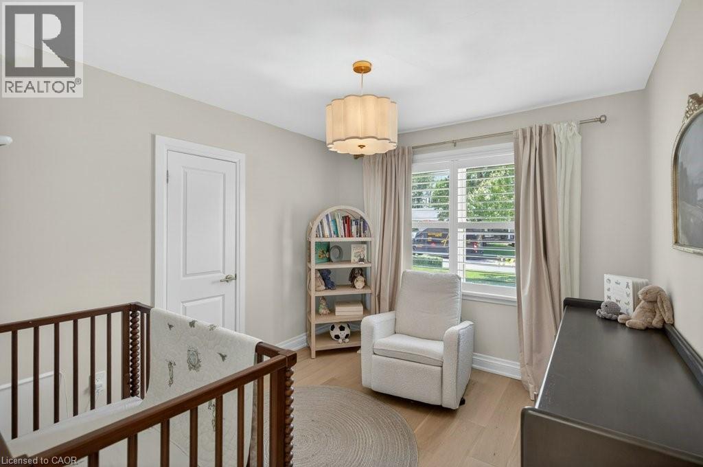 Bright room featuring light-toned walls and wood-finish flooring - 603 Cornick Drive, Burlington, ON