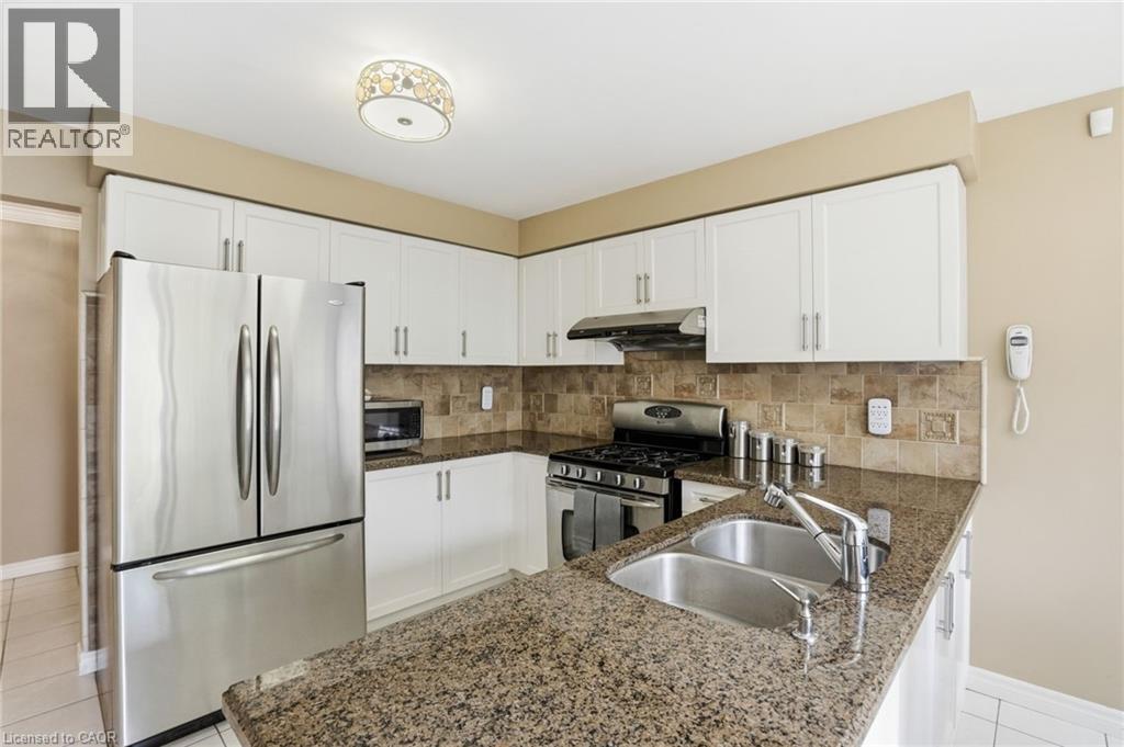 3277 Folkway Drive, Burlington, ON - Indoor Photo Showing Kitchen With Double Sink