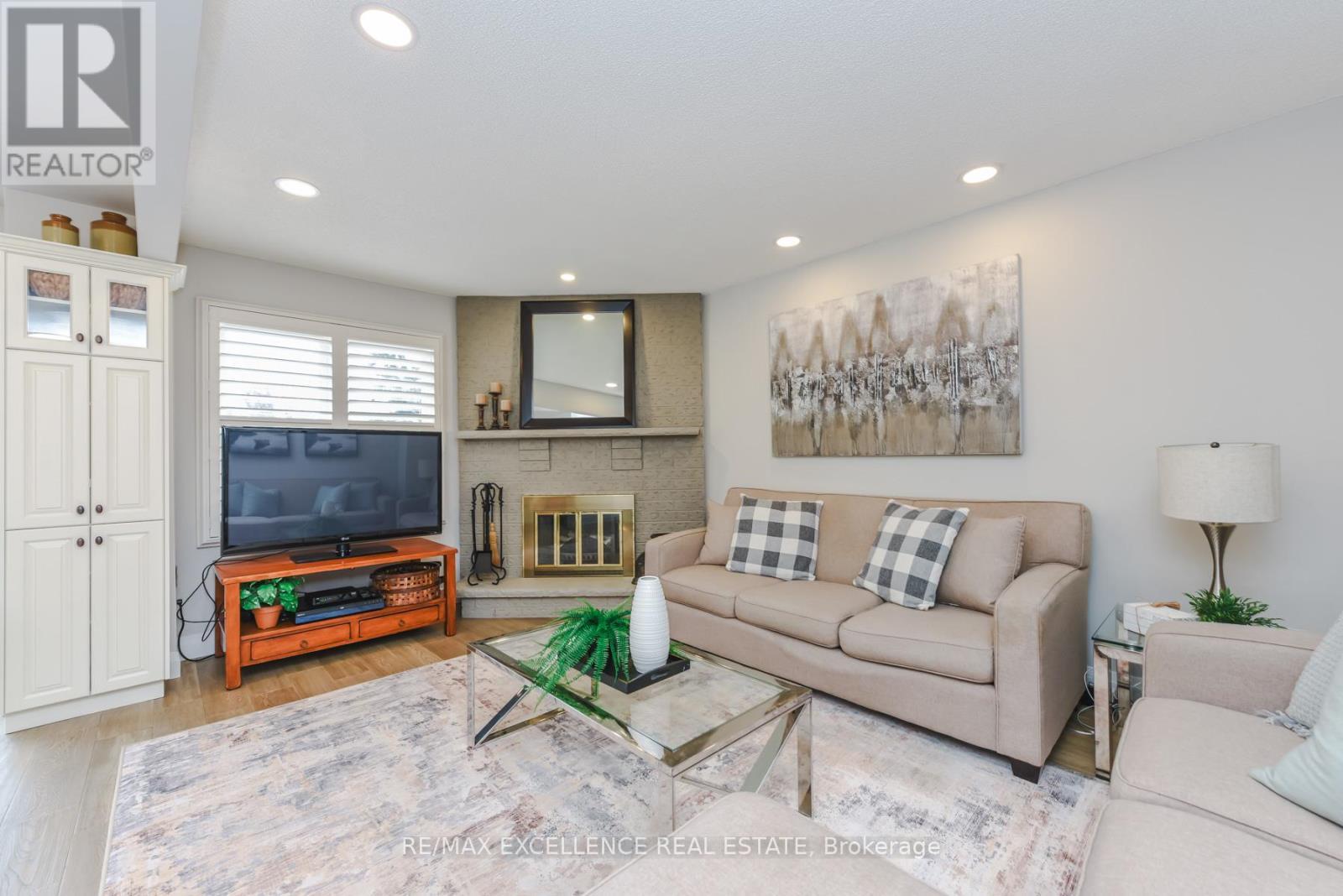 62 Atkins Circle, Brampton, ON - Indoor Photo Showing Living Room With Fireplace